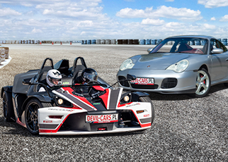 KTM X-BOW vs. Porsche 911 Carrera KTM X-BOW vs. Porsche 911 Carrera